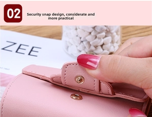 Detail of pink faux leather wallet featuring a secure metal snap button and stitching