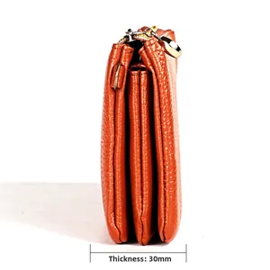 Side view of orange leather accordion wallet with three layers and 30mm thickness
