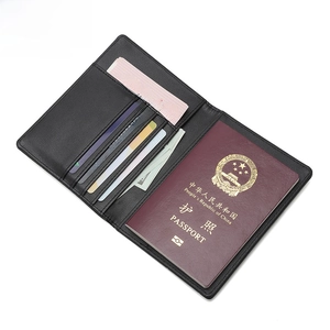 RFID blocking black leather travel wallet showing internal passport and card slots