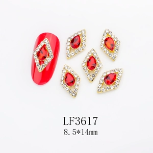 Detail of red water-drop crystal nail charm with rhombus frame, size 8.5x14mm