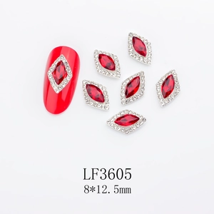 Detail of red marquise crystal nail charms with silver rhinestone border on 8x12.5mm alloy