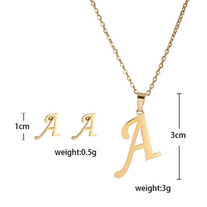 Detailed view of Letter A gold pendant and earrings set with size and weight specs