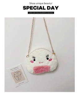 Detailed view of the cute rice ball plush crossbody bag with soft white fur and gold chain
