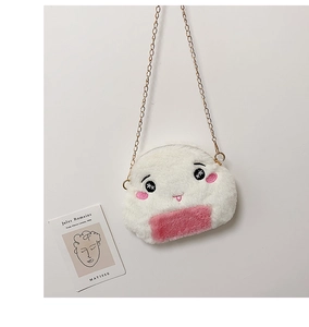 Detail of cute plush rice ball crossbody bag with embroidery and gold chain strap