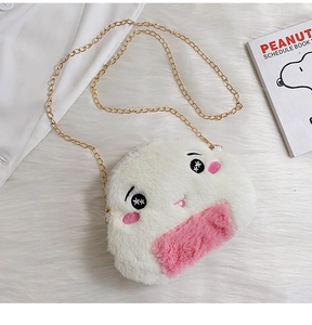 Detail of cute rice ball plush bag featuring soft embroidery and a gold chain strap