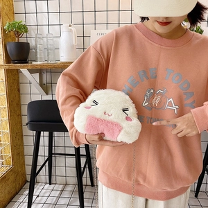 Cute Japanese style plush rice ball crossbody bag with pink details and metal chain strap