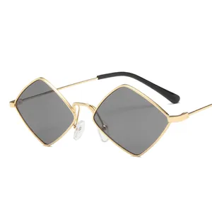 Retro geometric rhombus sunglasses with gold metal frame and dark grey tinted lenses
