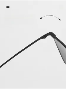 Close-up of durable matte black metal hinge and precision screw on retro sunglasses