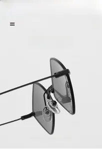 Detailed macro view of lightweight black metal sunglasses with elastic nose pads and frame
