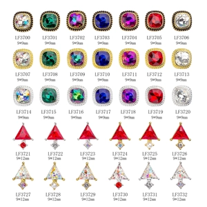 Assorted vintage nail art jewels in multiple colors and geometric shapes for manicure