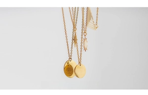 Detailed collection of gold stainless steel necklaces with evil eye and sun star charms