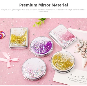 Detail view of portable folding mirrors with colorful flowing quicksand and sequins
