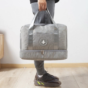 Gray double-layer travel wash bag with separate bottom compartment for dry and wet storage