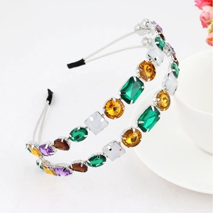 Detail of double-layer silver headband with multi-colored crystals and rhinestones