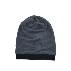 Winter knitted beanie for men and women with warm fleece lining and metal logo detail