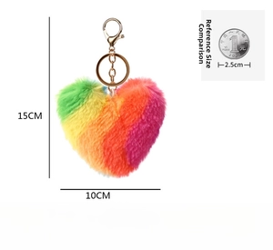 Detail view of 15cm rainbow heart plush keychain with golden metal lobster clasp