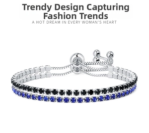 Detail of double-layer tennis bracelet with blue and black cubic zirconia and toggle clasp