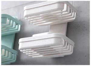 Detail view of double-layer wheat straw soap holder with drainage and wall-mount adhesive
