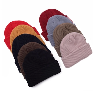 Multiple colors of ribbed knit beanies in vintage docker style for men and women