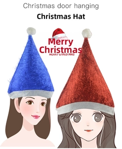 Detail of red and blue metallic Christmas hats with white fluffy pom-poms on top