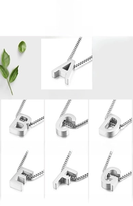 Detailed grid view of 3D silver heart-shaped initial pendants with sturdy box chains