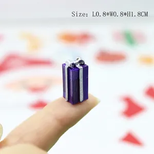 Miniature purple gift box resin accessory with silver bow for DIY craft projects