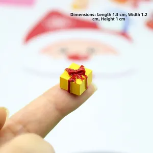 Miniature yellow gift box model with red bow decoration measuring 1.3cm x 1.2cm x 1cm