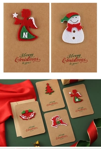 Detail of vintage kraft paper Christmas cards with felt 3D ornaments and envelopes