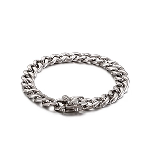 Polished silver stainless steel Cuban link bracelet with detailed dragon head clasp
