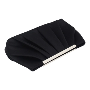 Detail of elegant black pleated satin evening clutch bag with silver metal frame and clasp
