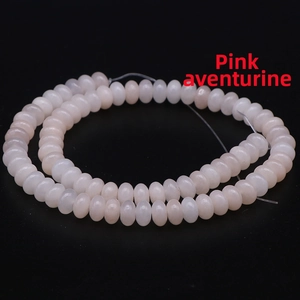 Macro shot of natural pink aventurine abacus beads for DIY jewelry making accessories