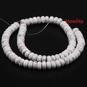 Macro shot of white howlite abacus beads with gray marble texture for DIY jewelry making