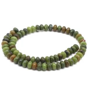 Detailed macro view of natural green Taiwan Jade abacus beads for DIY jewelry making