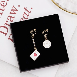 Asymmetric Alice earrings with poker card, clock pendant, and pearls in gold finish