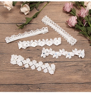 Set of 5 white lace flower headbands with pearls and crystals for girls on dark wood