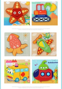 Detail of wooden puzzles for toddlers showing animals and vehicles for early education