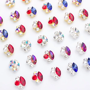 Variety pack of alloy nail art gems featuring horse-eye cut stones with pearl accents