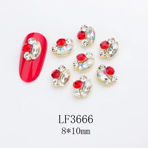 Macro shot of 8x10mm marquise rhinestones and gold alloy nail jewelry detail