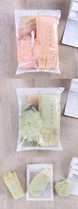 Three-piece bath set detail featuring exfoliating glove, back scrubber and shower ball