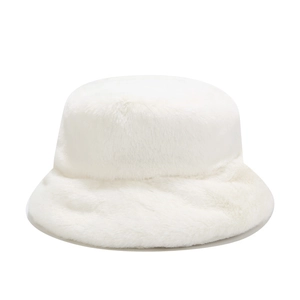 Close-up of soft white faux fur texture on a minimalist winter bucket hat for women