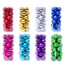Detail of multi-colored Christmas ornaments set in transparent cylindrical tubes