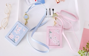 Pastel PU leather ID card holder with retractable lanyard and cherry blossom pattern