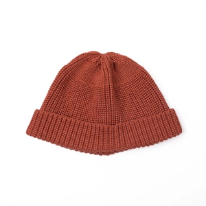Unisex caramel knit beanie with chunky ribbed texture and rolled edge design