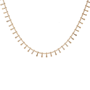 Golden necklace with textured teardrop pendants on a minimalist white background