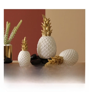 Three-piece white and gold pineapple decor set with textured matte finish details