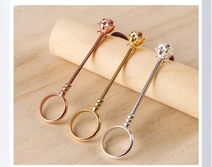 Three elegant rose flower smoking ring holders in gold, rose gold and silver finishes