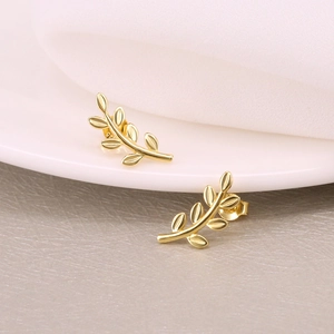 Detail of S925 sterling silver leaf earrings showing the S925 hallmark and polished gold finish