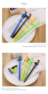 Detail of 0.5mm black ink needle tip on cute dinosaur-shaped gel pens for smooth writing