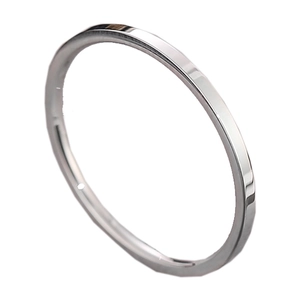Minimalist silver stainless steel band ring with a polished finish on white background