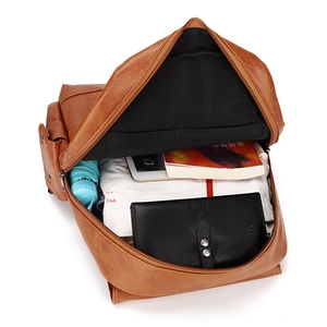 Brown vintage PU leather backpack for men showing spacious main compartment capacity